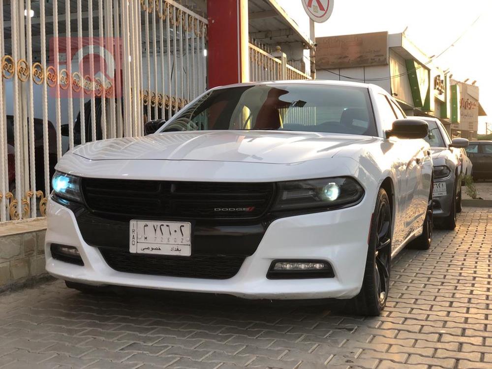 دۆج چارجەر